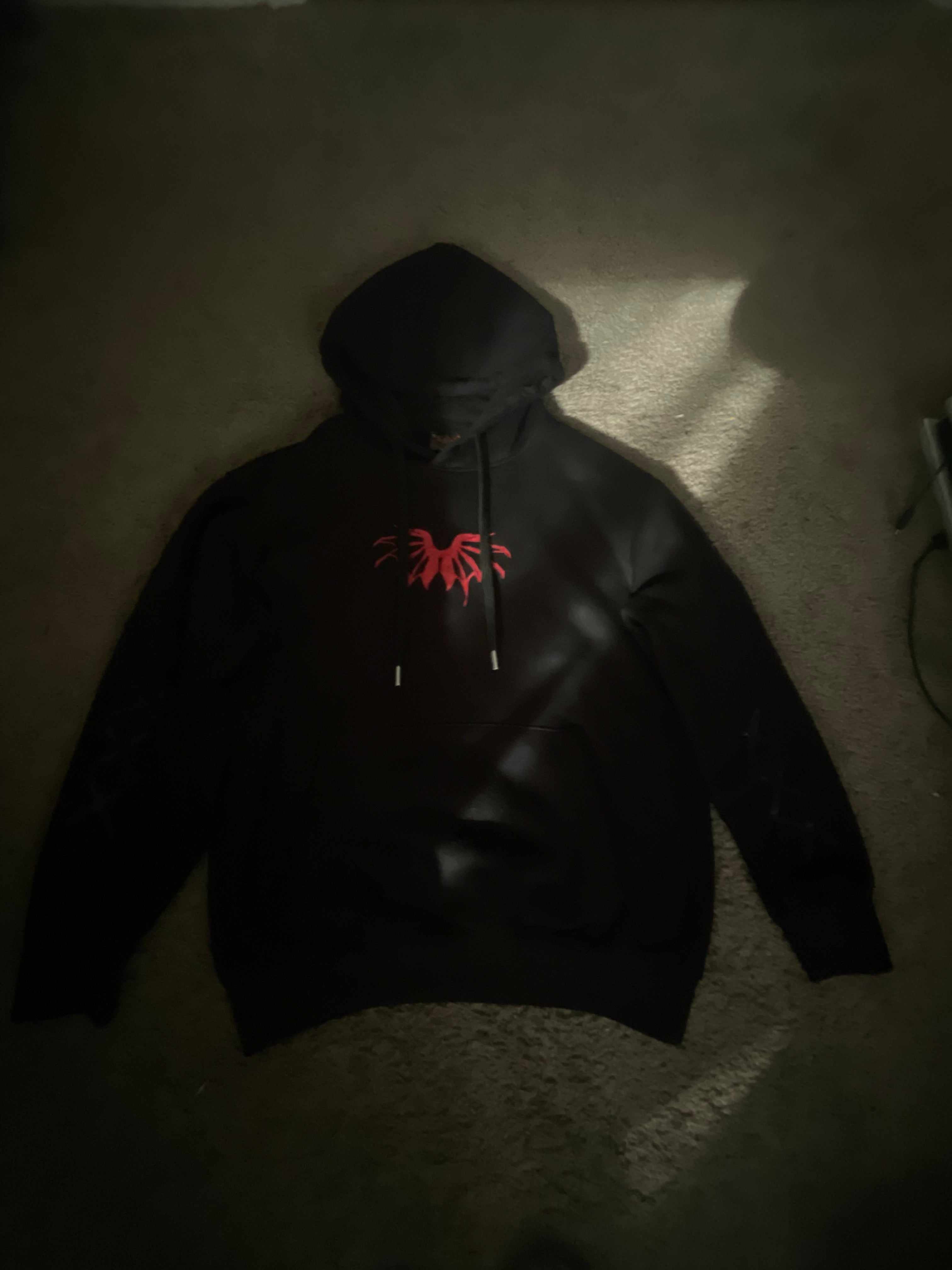 Black X6 Creature hoodie with red design, men's cotton drawstring sweatshirt with double side pockets and heat printed triple X on sleeves