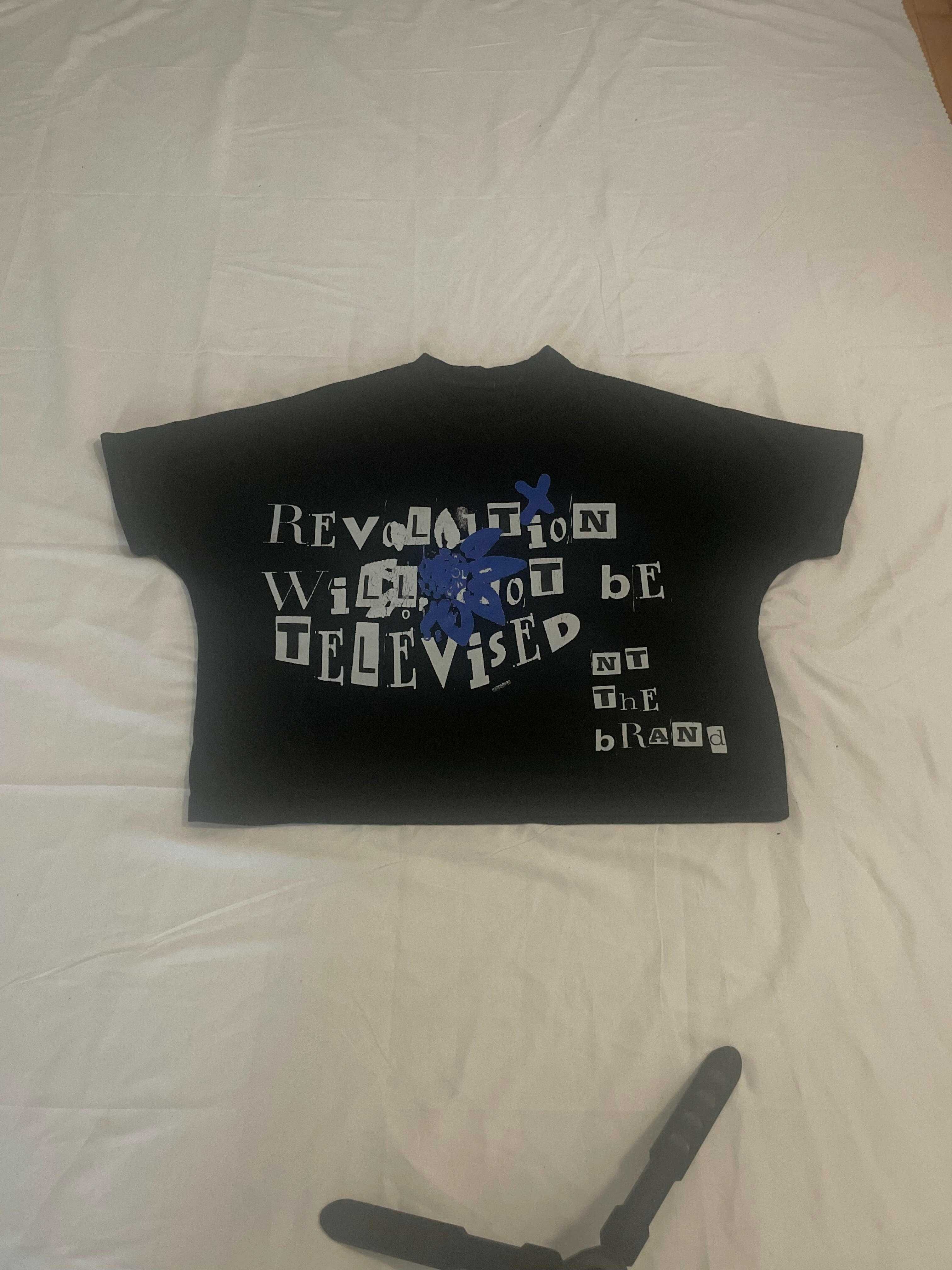 RWTBT Revolutuion Blue box fit T-shirt with front screen printed logo and flower x symbol, 100% cotton and polyester blend, fits true to size, RWNBT shirt