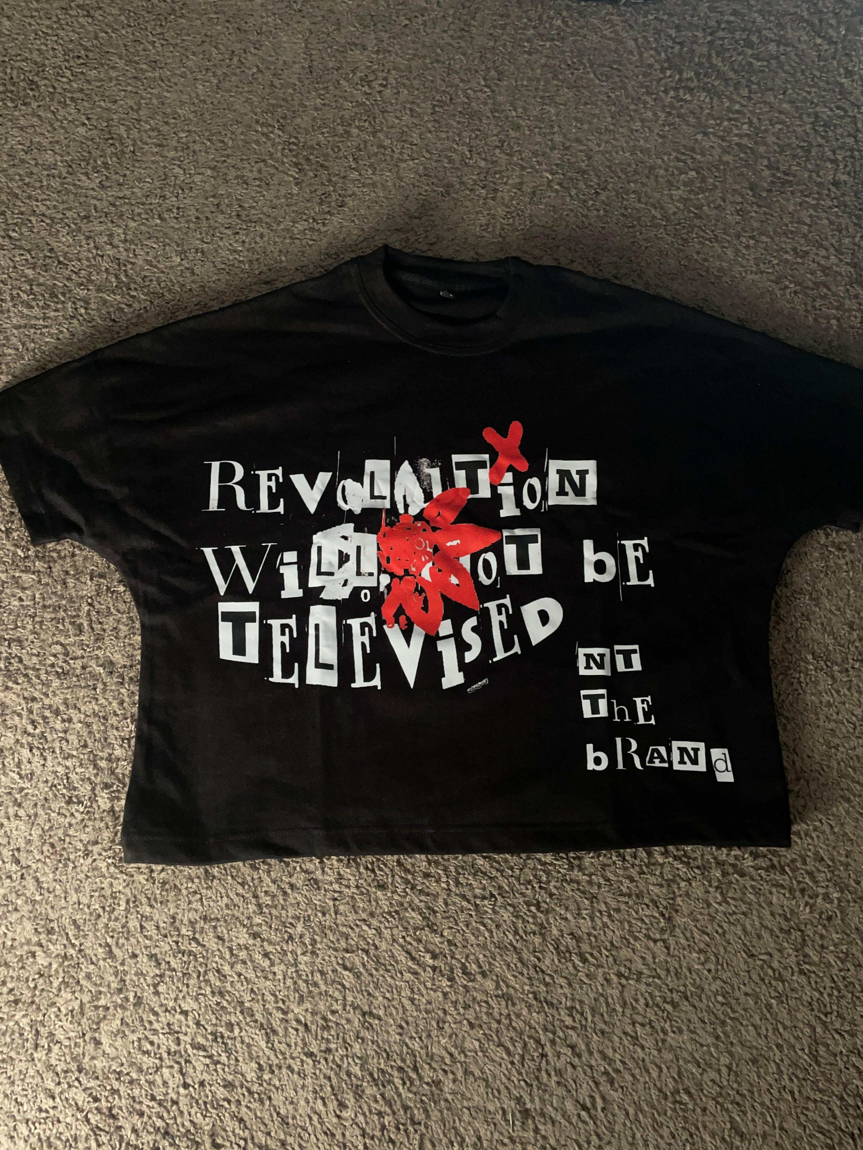 Black box fit t-shirt with red flower and white Revolution Will Not Be Televised logo screen print
